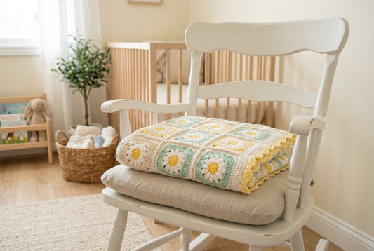 Spring Baby Blanket made with pastel crochet daisy granny squares